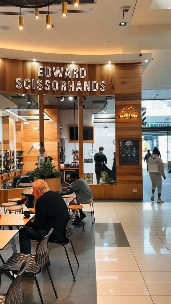 The Edward Scissorhands shopfront and lit signage