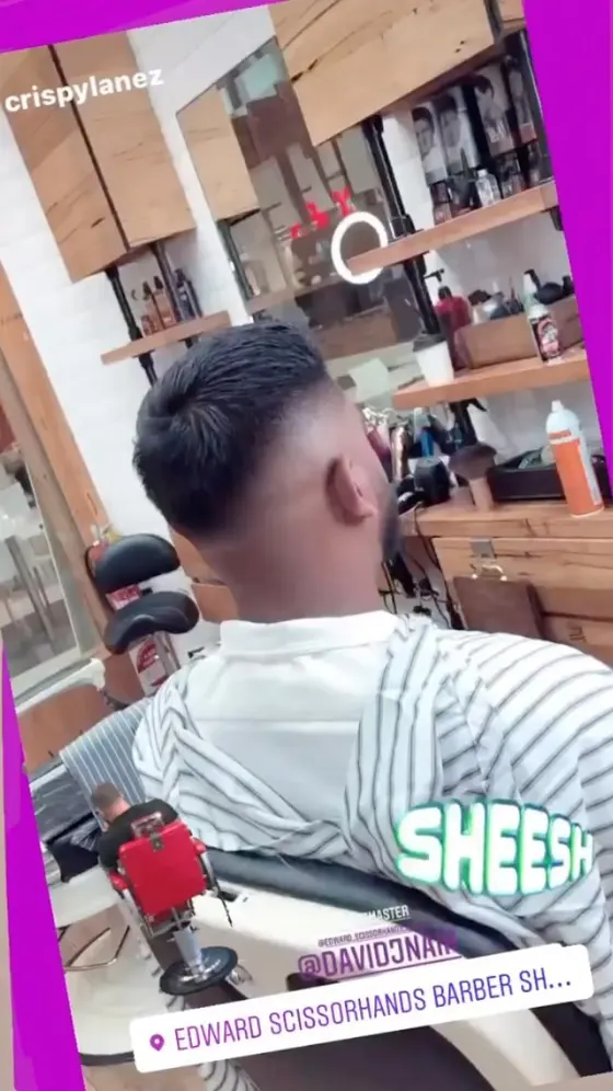 A finished skin fade seen from behind the chair