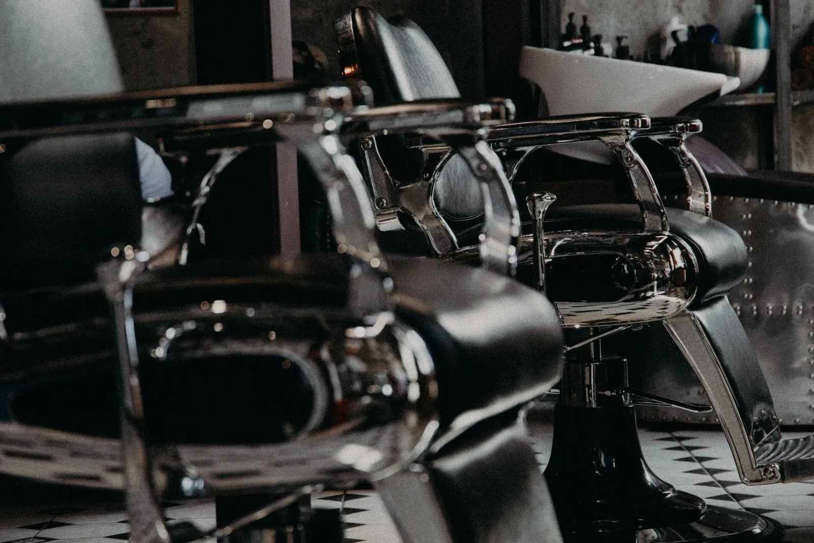Vintage leather and chrome barber chairs at Edward Scissorhands