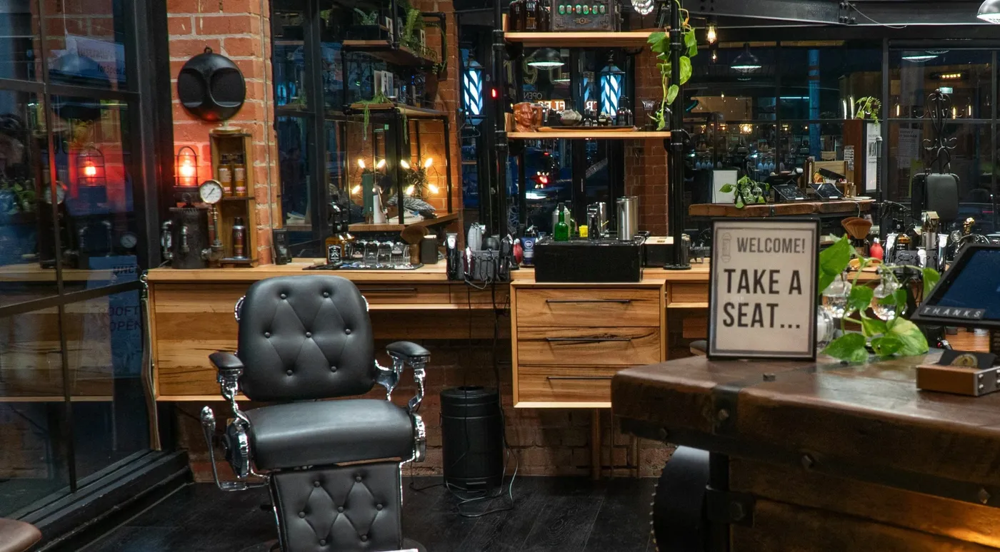 Inside the Edward Scissorhands shop, sleek chairs and warm lighting