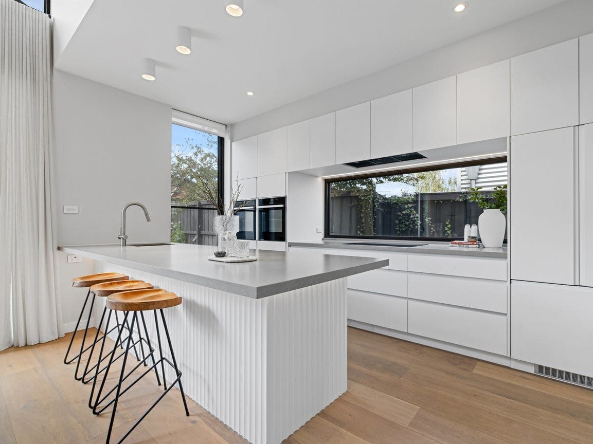 New kitchen with a fluted island and stone benchtop